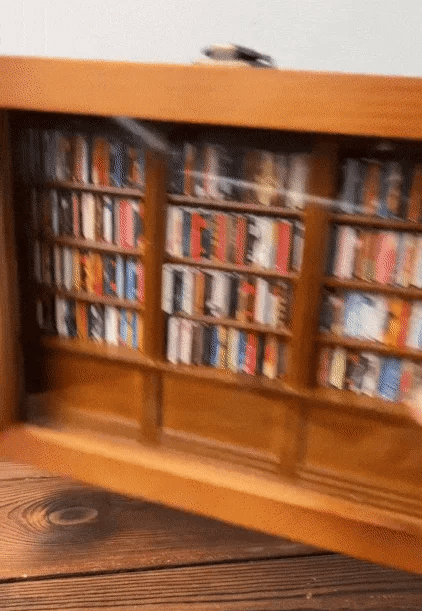 Laredo Anxiety Bookshelf in brown, featuring a unique design to help shake away anxiety and organize your space.